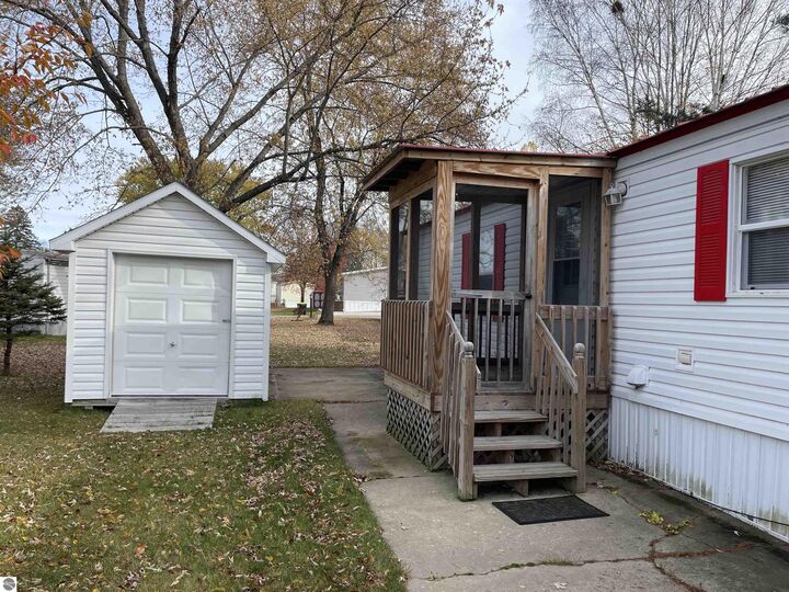 Property Photo:  310 Kristy Jo Street  MI 49601 