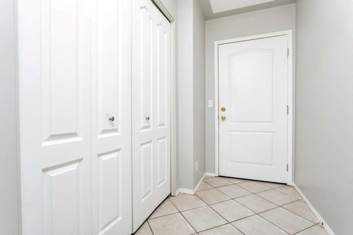 Property Photo: 5135 Lakeshore Drive 312 AB T4S 1E2