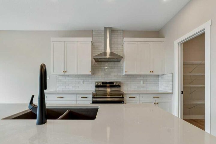 Property Photo:  103 Riverford Close W  AB T1K 8E6 
