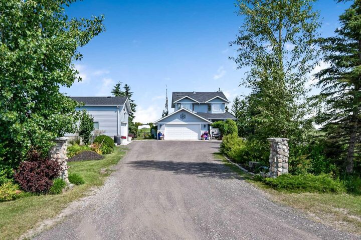 Property Photo: 48224 320 Avenue E AB T1S 4R9