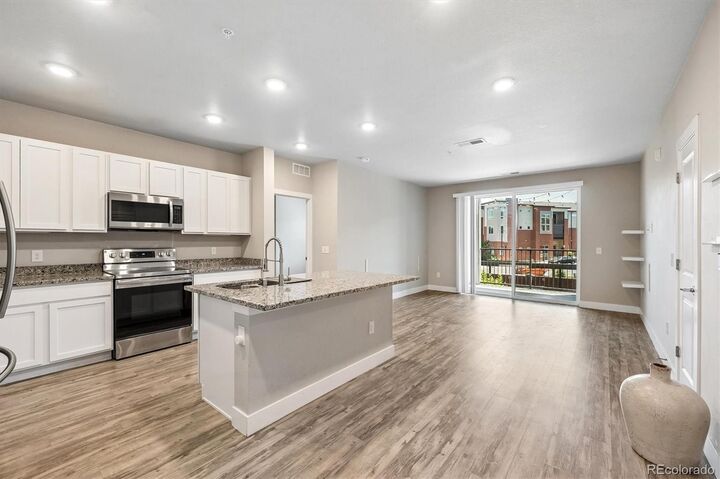 Property Photo:  14331 E Tennessee Avenue 206  CO 80012 