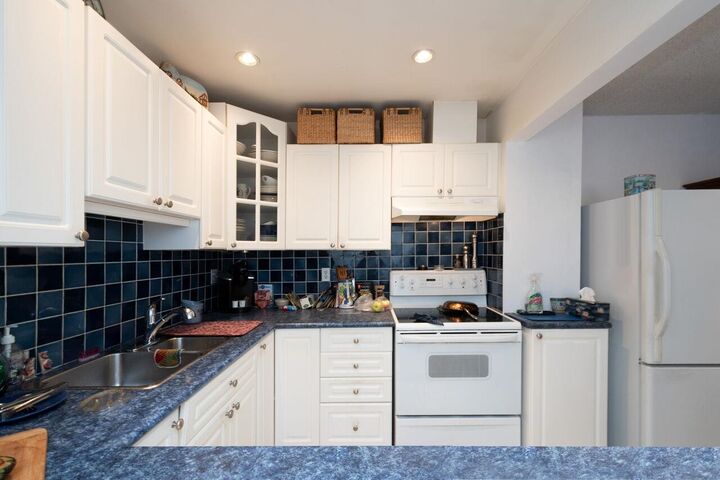 Property Photo: 1950 Cedar Village Crescent 88 BC V7J 3M5