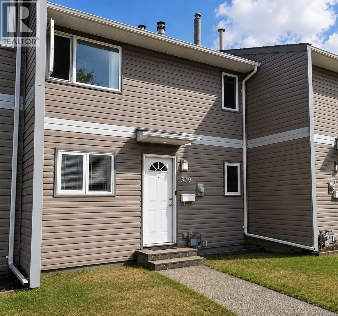 Property Photo: 2550 Ospika Boulevard 319 BC V2N 3T2