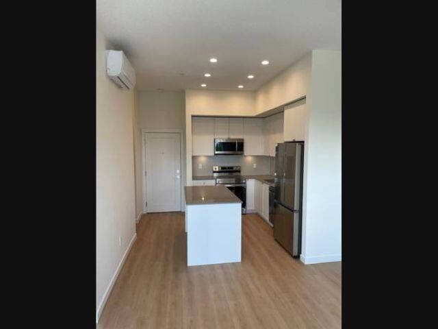 Property Photo: 14778 106 Avenue 617 BC V3R 5Y1