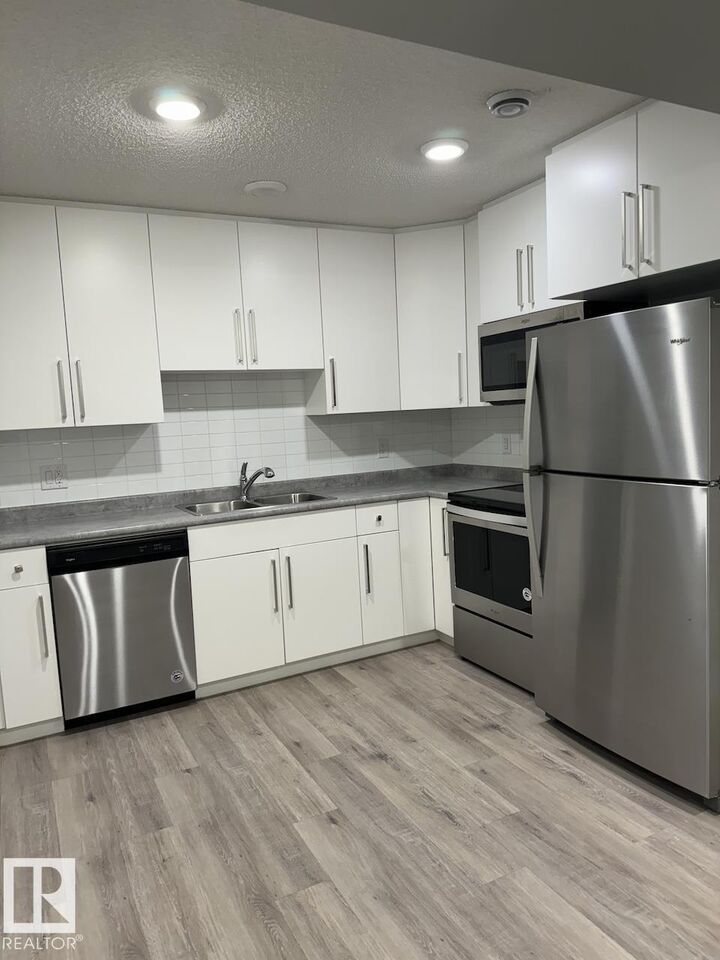 Property Photo: 6417 177 Avenue NW Bsmt AB T5Y 3X4