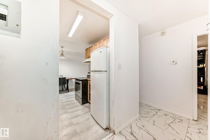 Property Photo: 5715 133 Avenue NW 5C AB T5A 0K3