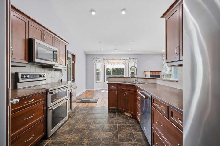 Property Photo: 253037 Township Road 432 AB T4J 1R2