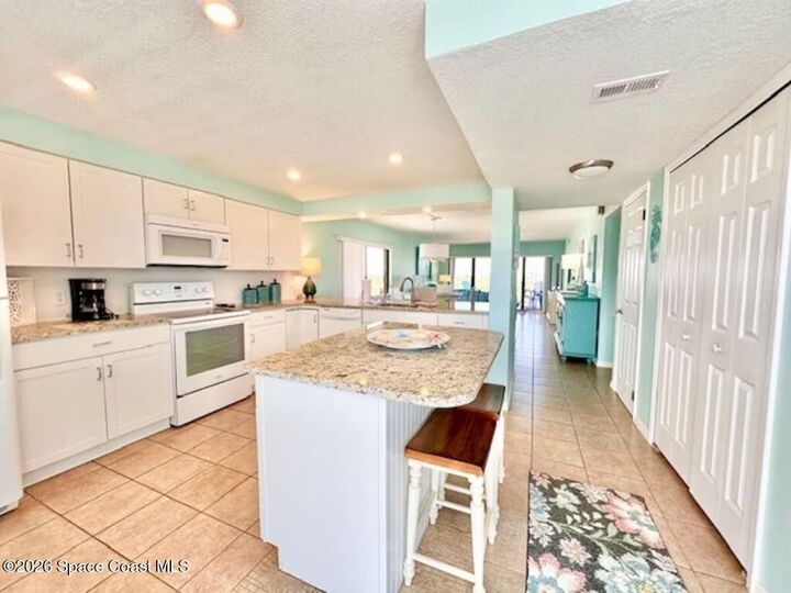 Property Photo:  1050 N Atlantic Avenue  FL 32931 