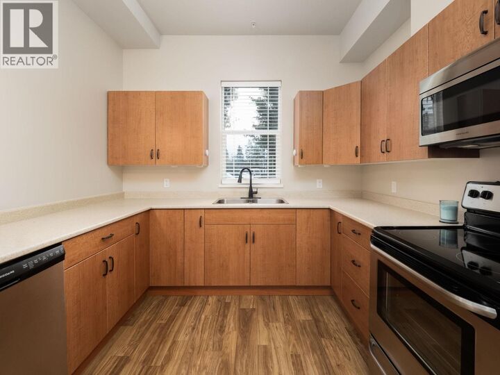 Property Photo: 1444 20th Avenue 105 BC V2L 0C9