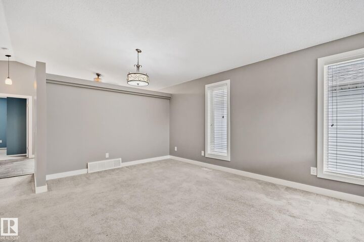 Property Photo: 867 Blacklock Way SW AB T6W 1C4