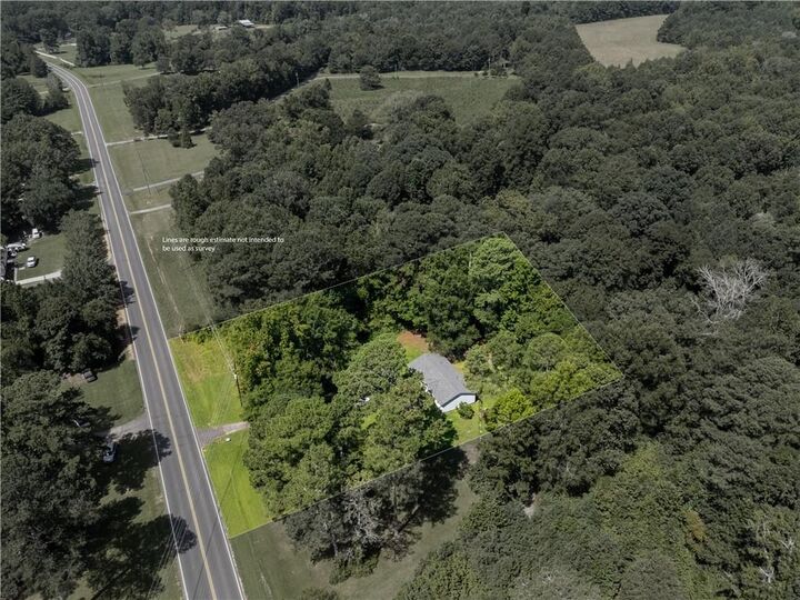 Property Photo:  1085 New Rosedale Road NE  GA 30105 