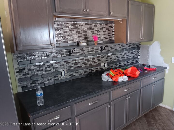 Property Photo:  1901 W Holmes Road  MI 48910 
