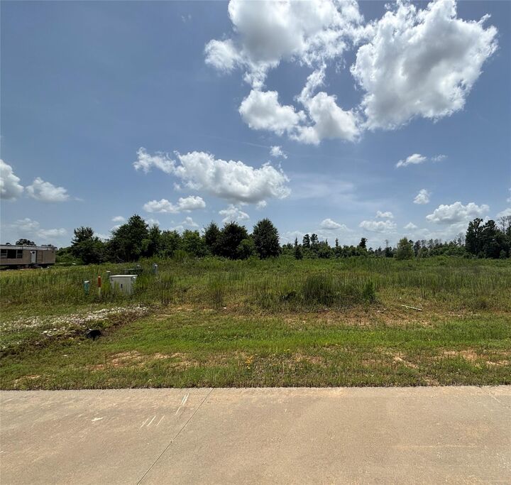 Property Photo:  113 Road 5888  TX 77327 