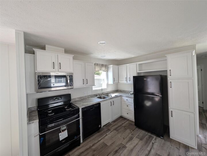 Property Photo: 11 Square Hill Road #27 NY 12553