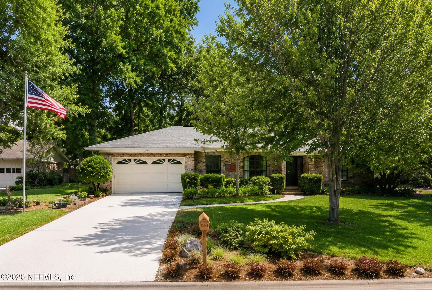 Property Photo:  11341 Woodsong Loop N  FL 32225 