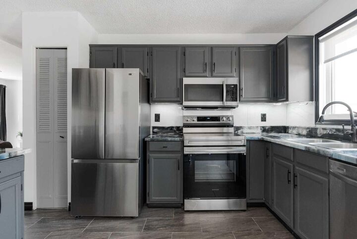 Property Photo: 146 McConachie Crescent AB T9K 1K7