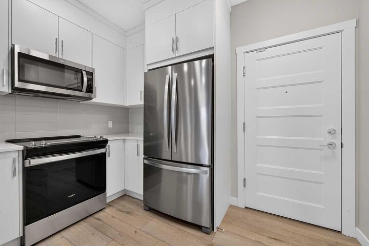 Property Photo:  55 Wolf Hollow Crescent SE 411  AB T2X 5K9 