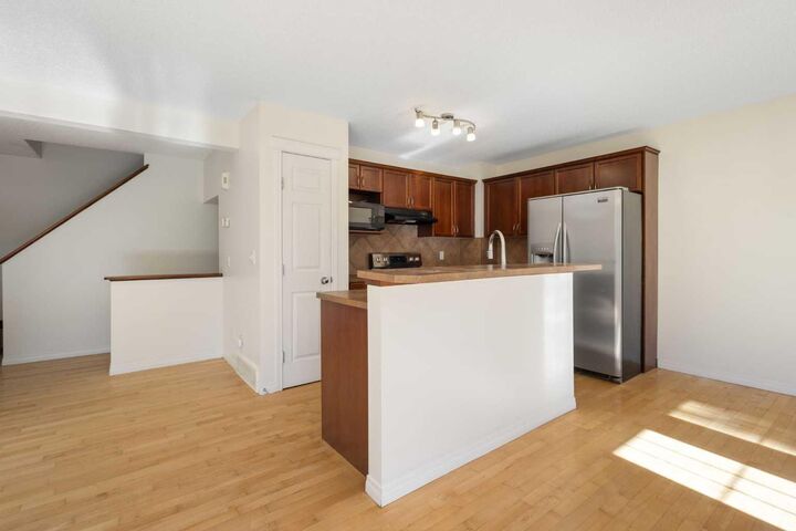 Property Photo: 78 Cougar Plateau Way SW AB T3H 5S4