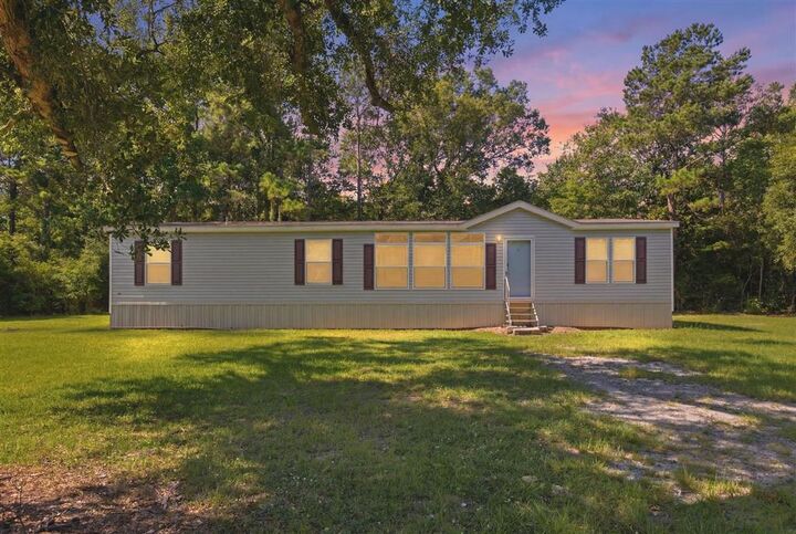 Property Photo:  213 Fielding Williams Road  LA 70660 
