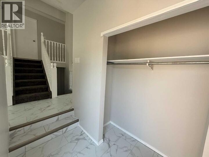 Property Photo: 2725 57B Avenue AB T9V 2N1