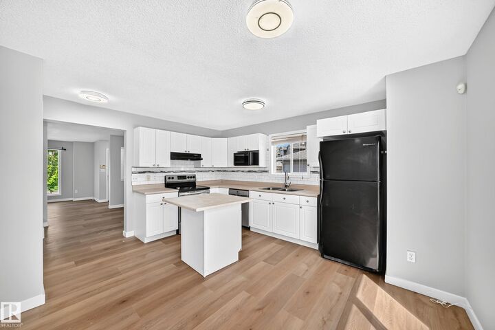 Property Photo:  203 84 Street SW  AB T6X 1H6 