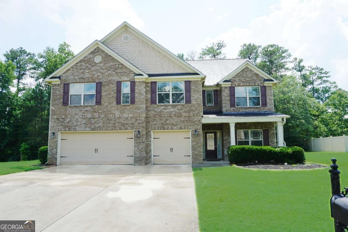 Property Photo: 5669 Woodland Greens Road GA 30135