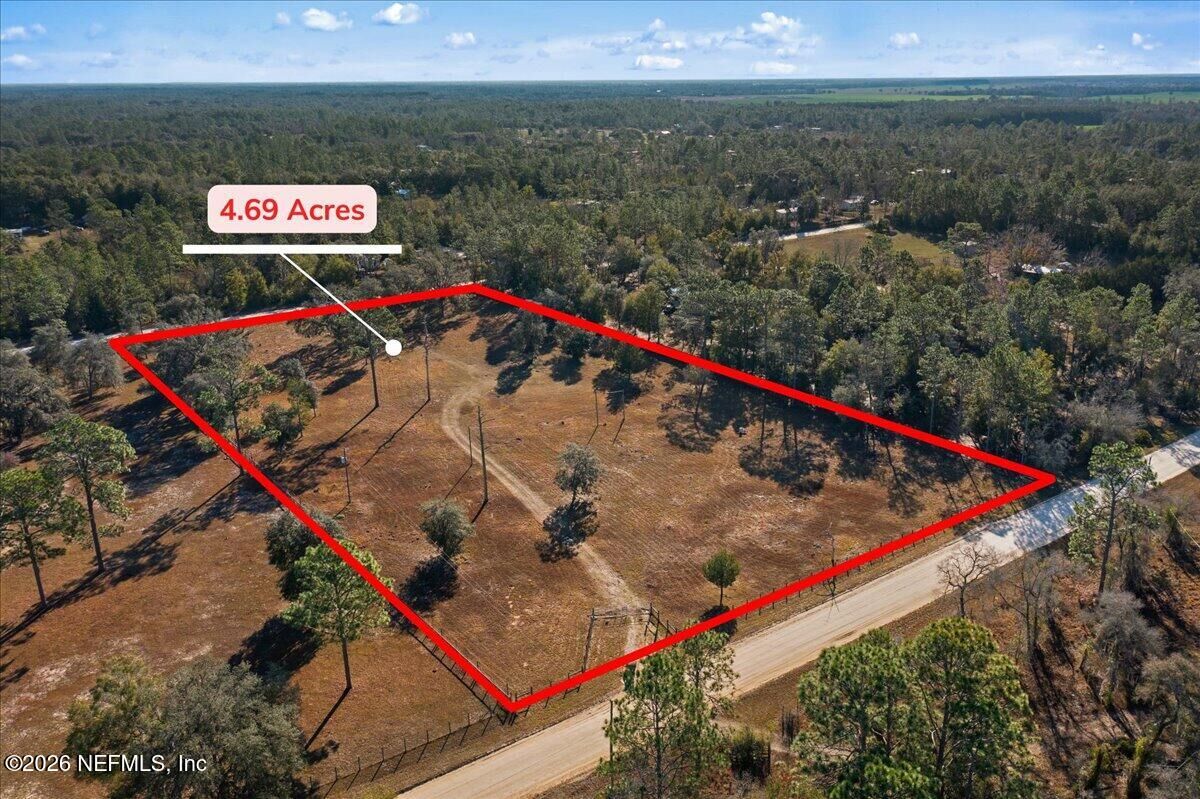 Property Photo:  5551 NE 106 Court  FL 32621 
