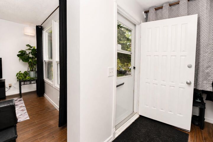 Property Photo: 6527 Huntsbay Road NW AB T2K 5R3