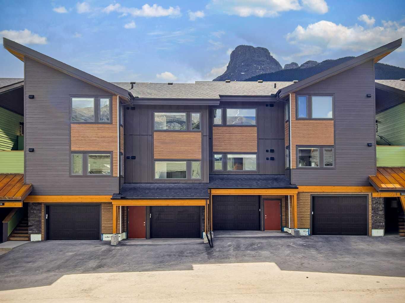 Property Photo: 209 Stewart Creek Rise 202G AB T1W 0N9