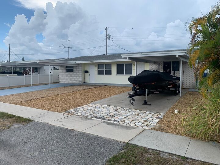Property Photo:  1311 Alho Drive  FL 33462 