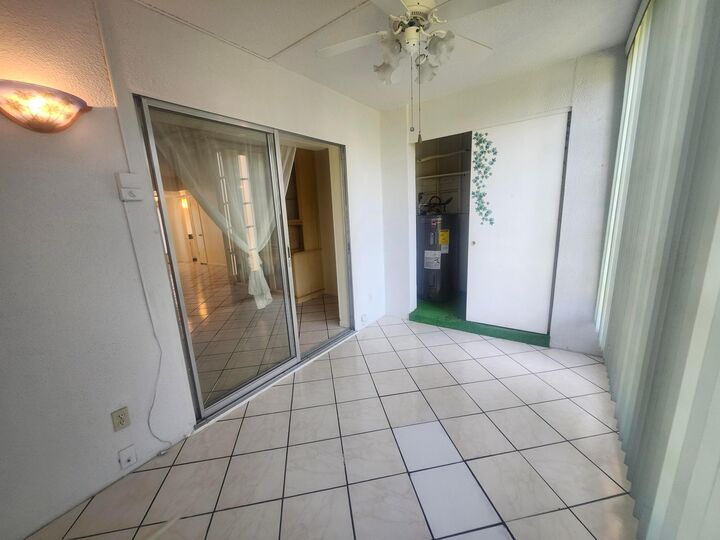 Property Photo:  230 NE 26th Avenue 209  FL 33435 