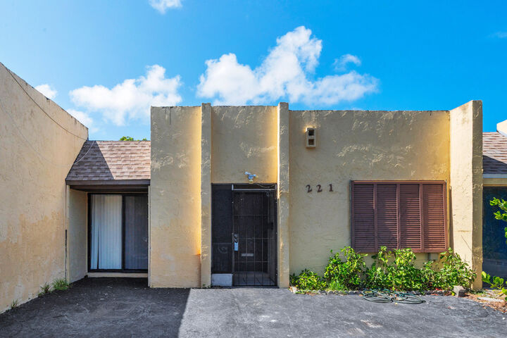Property Photo:  221 NW 43rd Place  FL 33064 