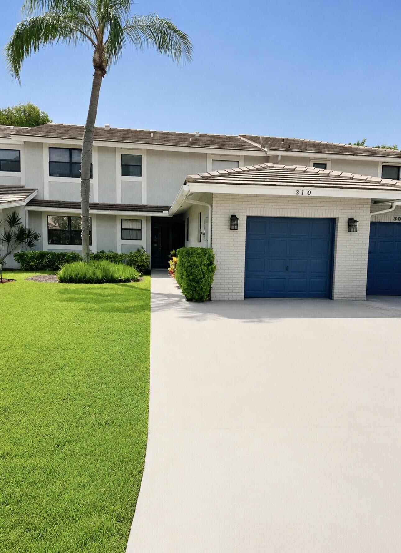 Property Photo:  310 Deer Creek Lakeside Way  FL 33442 