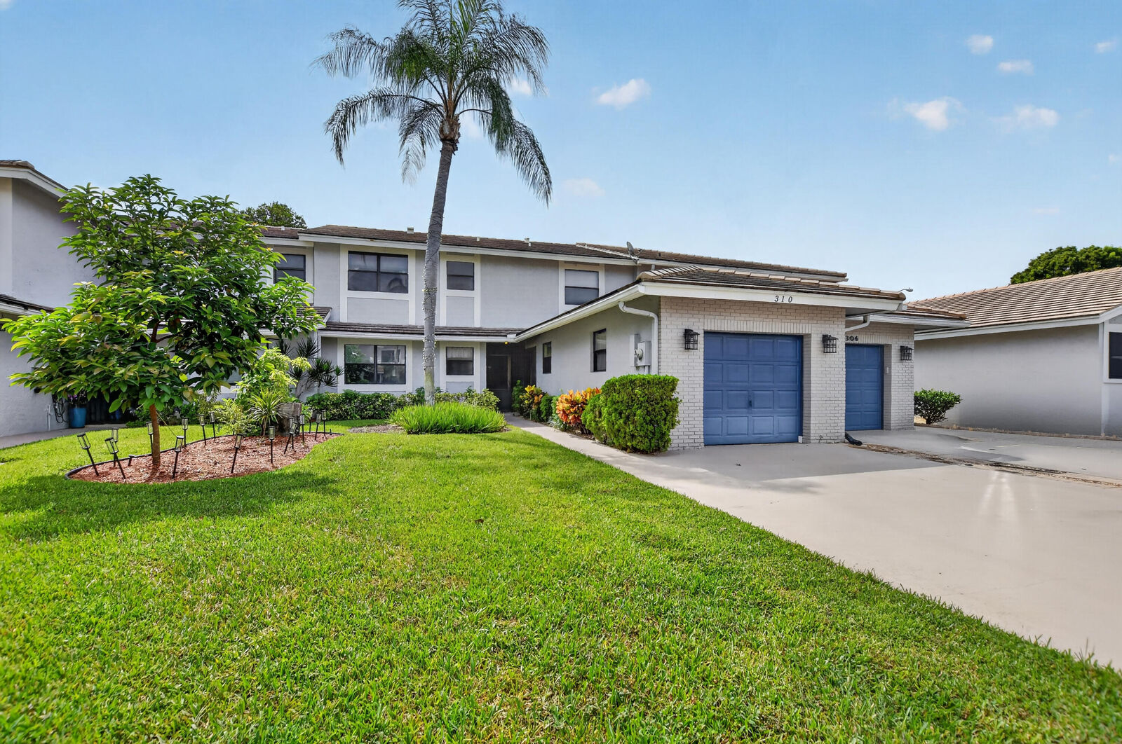 Property Photo: 310 Deer Creek Lakeside Way FL 33442