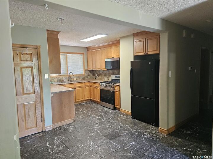 Property Photo:  2018 Morgan Avenue  SK S7J 2E1 