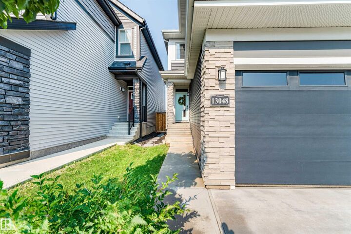 Property Photo:  13048 211 Street NW  AB T5S 0P5 