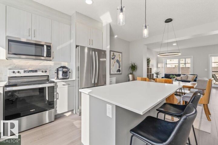 Property Photo: 11910 35 Avenue SW 30 AB T6W 4Z8