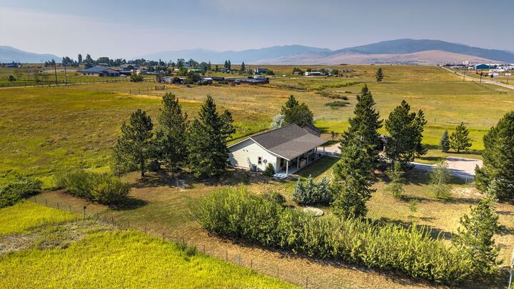 Property Photo:  6895 Deschamps Lane  MT 59808 