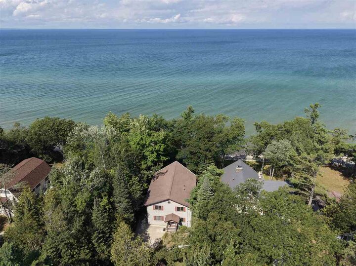 Property Photo:  8751 Cordwood  MI 49721 