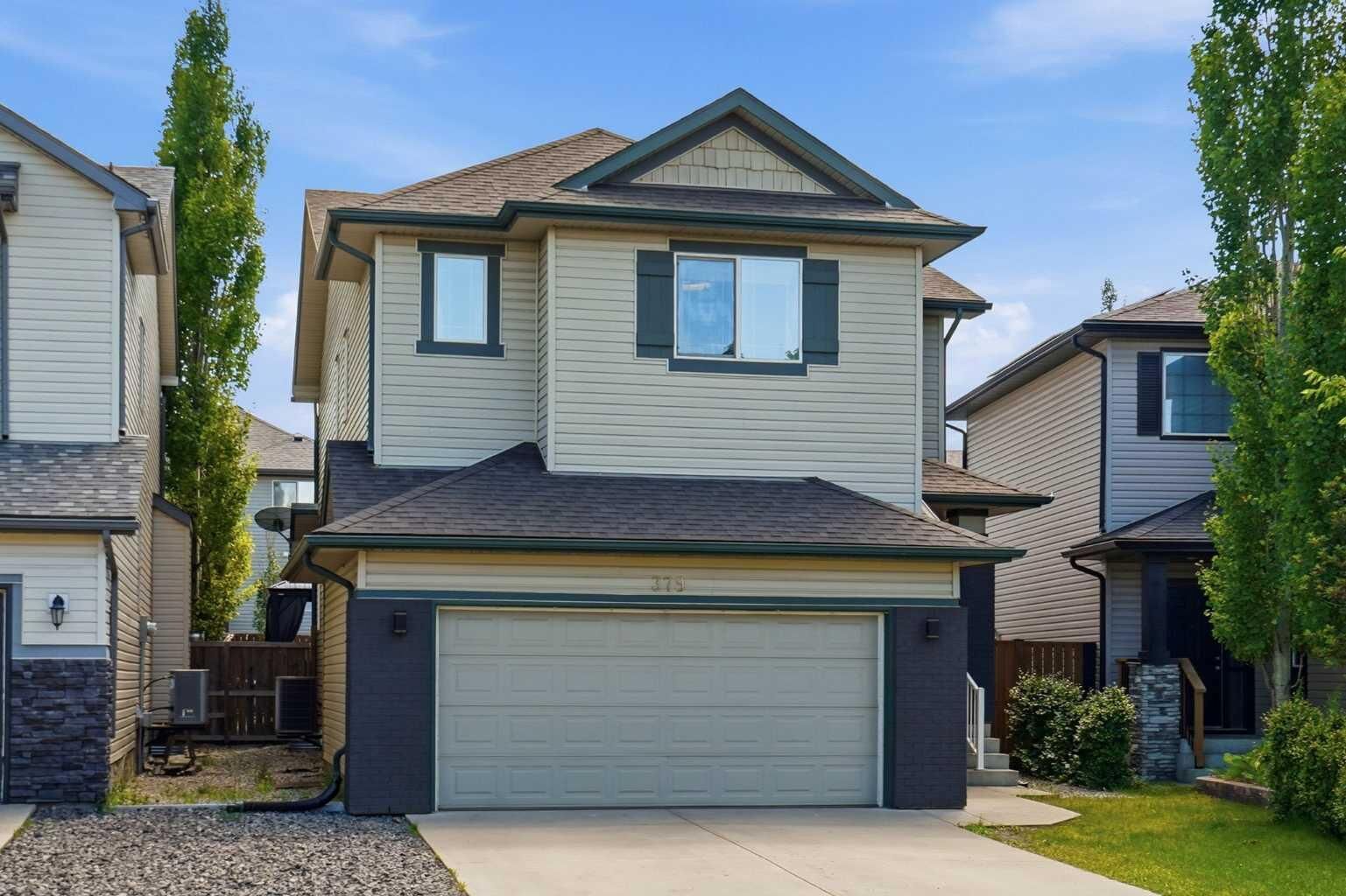 Property Photo:  379 Cimarron Boulevard  AB T1S 2L8 