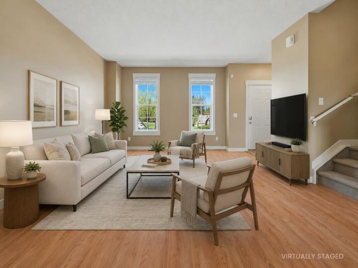 Property Photo: 320 Rainbow Falls Drive AB T1X 0E4
