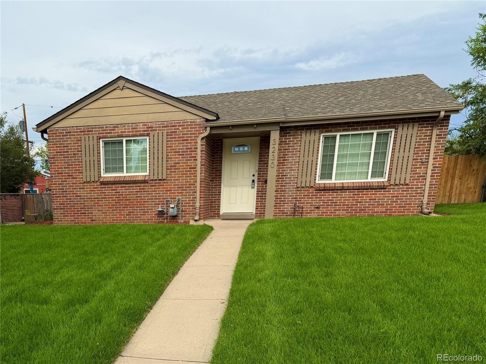Property Photo:  3230 Magnolia Street  CO 80207 