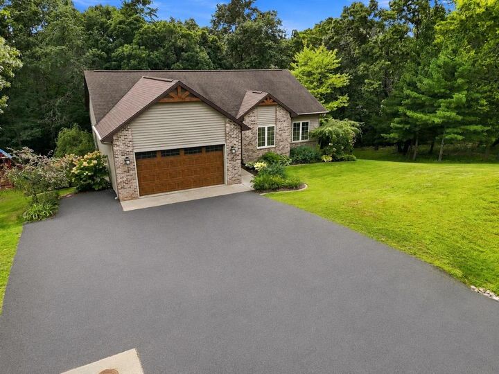 Property Photo:  E9265 Pebblebeach Drive  WI 53965 