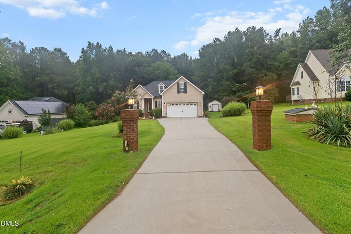 Property Photo:  128 Redbud Drive  NC 27520 