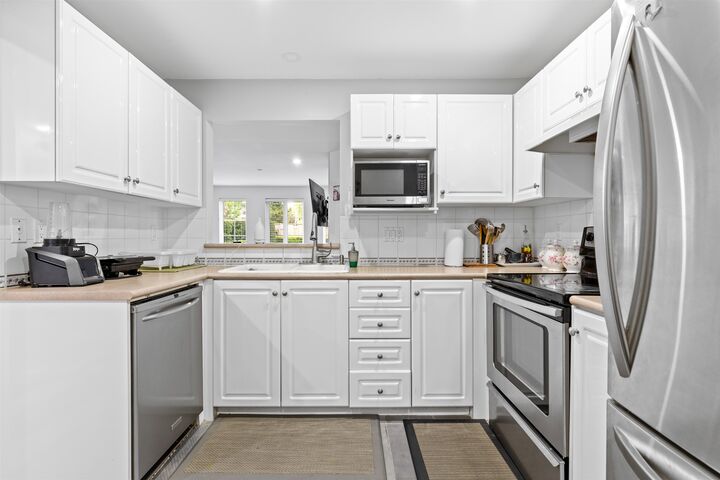 Property Photo: 12125 75A Avenue 105 BC V3W 1B9