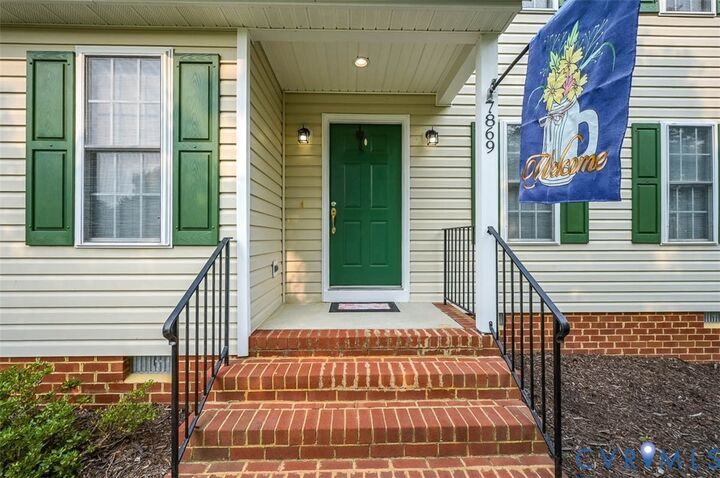 Property Photo: 7869 Silktree Place VA 23111