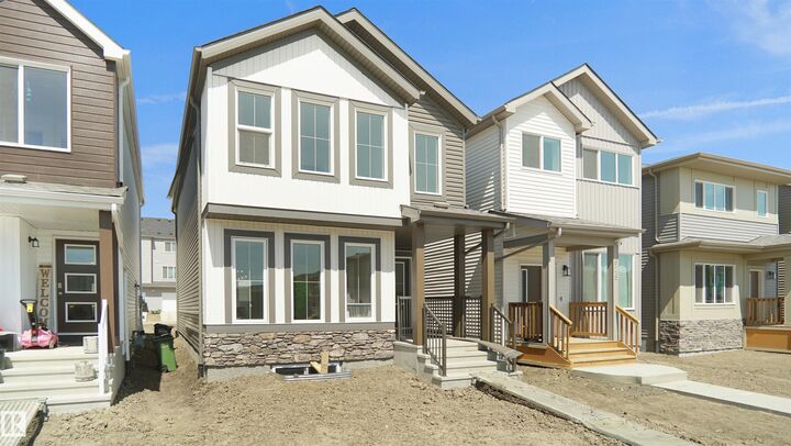 Property Photo:  7387 Keeler Crescent SW  AB T6W 4J9 
