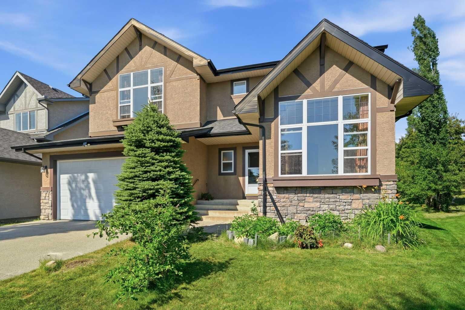 Property Photo: 242 Tusslewood Grove NW AB T3L 2Y4