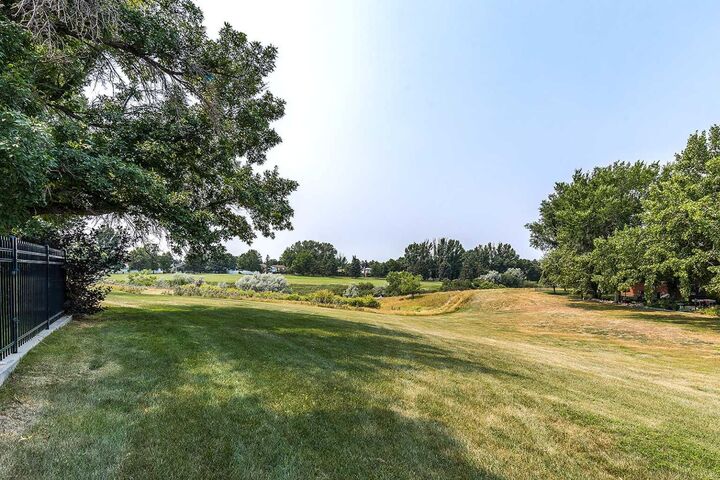 Property Photo:  42 Buttercup Court SE  AB T1B 2G9 