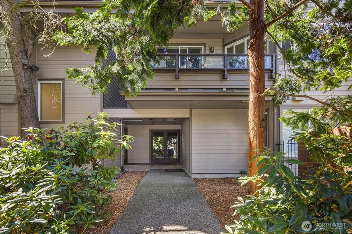 Property Photo:  6055  35th Avenue SW 107  WA 98126 
